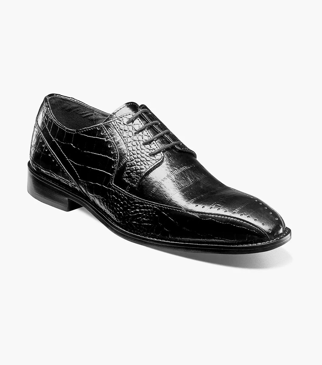 The Stacy Adams Talamanco Bike Toe Oxford in black (style 25788-001) features crocodile print leather with brogue detailing on the toe, a RedZone footbed for added comfort, and black laces, shown against a white background.