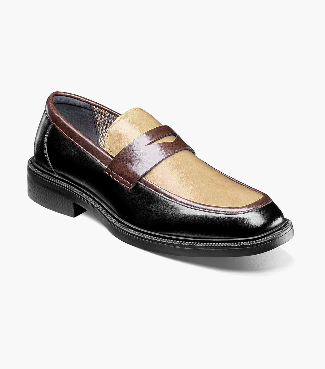 Introducing the Stacy Adams Everett Moc Toe Penny Slip On (25790-963): crafted by STACY ADAMS, this men’s dress shoe features a sophisticated design with a black sole, brown sides, and a tan upper. Accented by a classic penny strap across the top, it offers timeless style and comfort thanks to its cushioned insole—making it an ideal refined slip-on for all-day wear.