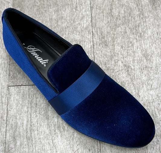 An Exclusive Formal Dress Shoe Dark Navy 7021 from UNIQUE DESIGN MENSWEAR, crafted in Italy, rests elegantly on a wooden floor.