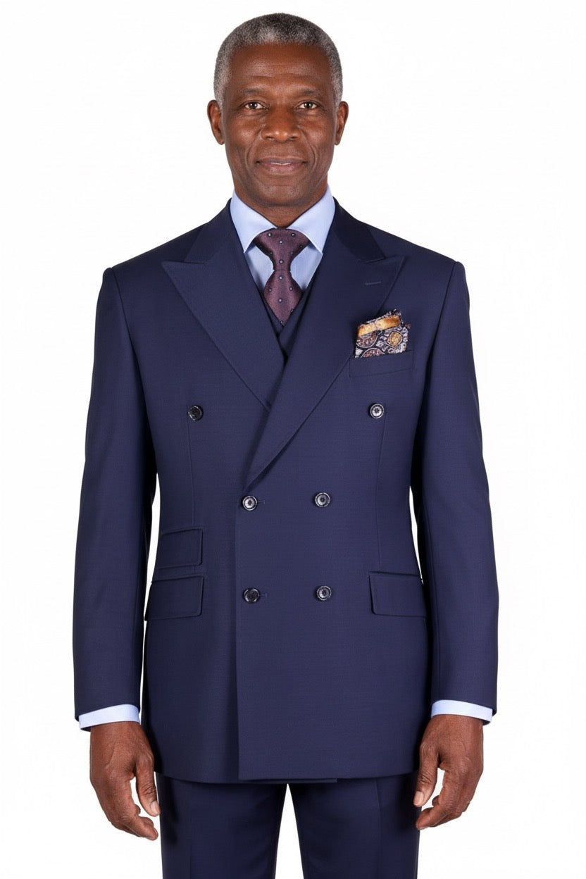 The Tiglio Rosso DB Este French Blue suit, paired with a light blue shirt, maroon tie, and patterned pocket square, exudes the sophisticated style unique to Tiglio Rosso suits.