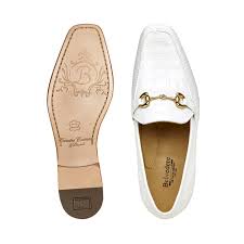 The Belvedere - 1030 White by BELVEDERE is a white leather loafer with crocodile texture, gold horsebit detail, low wooden heel, and tan lining.
