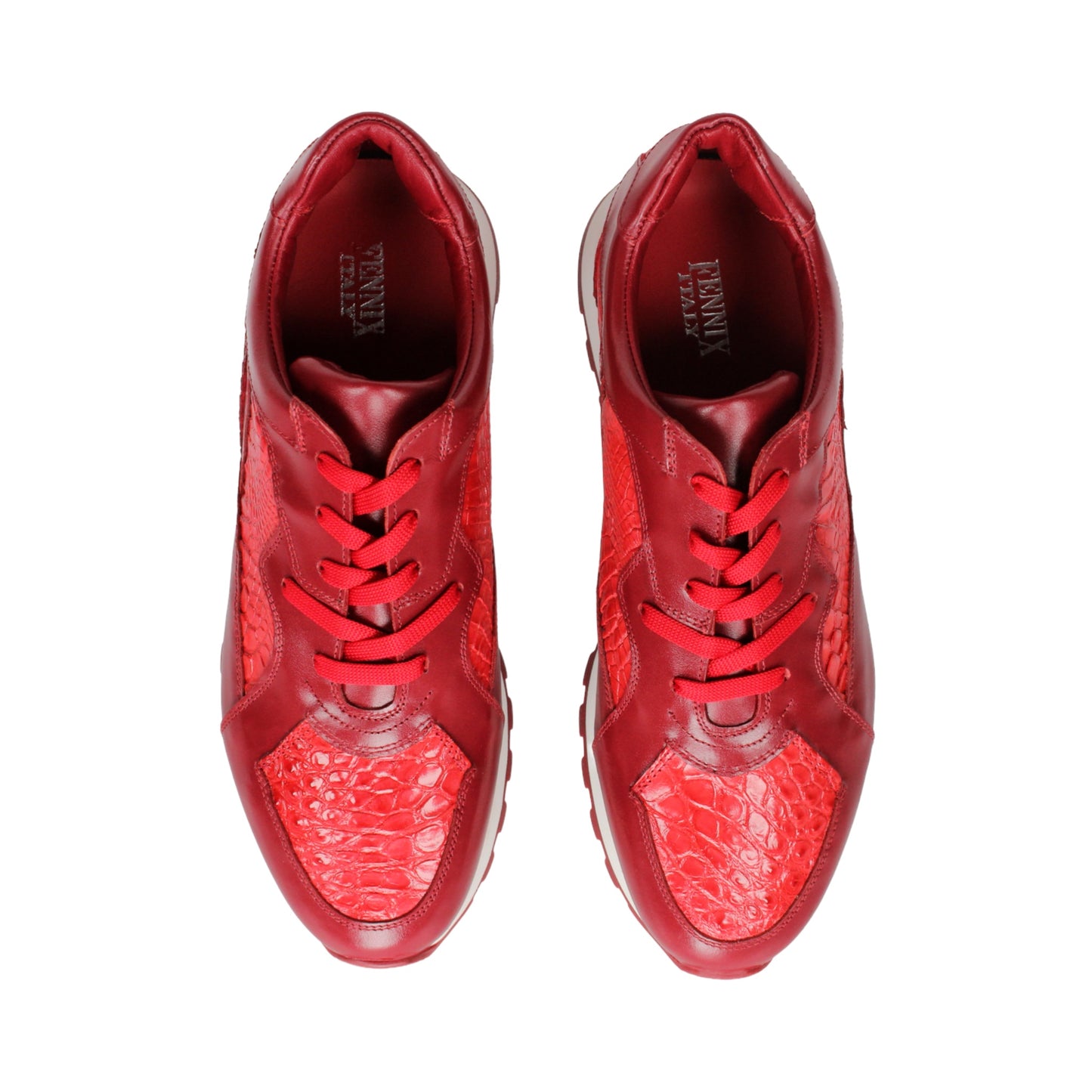 The Fennix 3538 Red by Fennix of Italy is a red athletic sneaker featuring a textured surface reminiscent of exotic leather, matching red laces, and a white midsole paired with a red outsole, displayed in profile view. Its expert craftsmanship provides a subtle nod to luxury Italian footwear, seamlessly blending style and sport in one sleek design.
