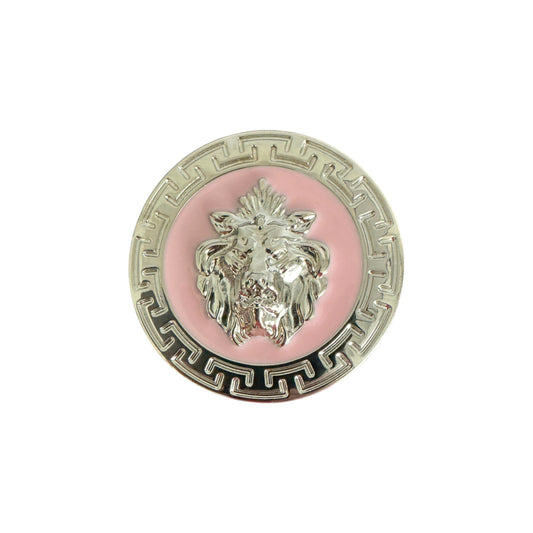 The Matiste Pink/Silver Belt Buckle 35mm B35 features a silver lion head on a pink background, bordered by a silver Greek key pattern—an elegant tribute to Italian craftsmanship from Matiste.