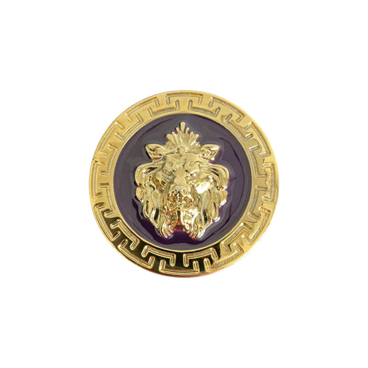 The Matiste Purple/Gold Belt Buckle 35mm B35 features a raised lion head center with Greek key border, gold and silver enamel accents on a purple background—echoing classic Matiste belt designs.
