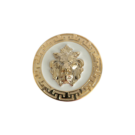 The Matiste White/Gold Belt Buckle 35mm B35 features a raised lion's head at the center, accented by a Greek key border.