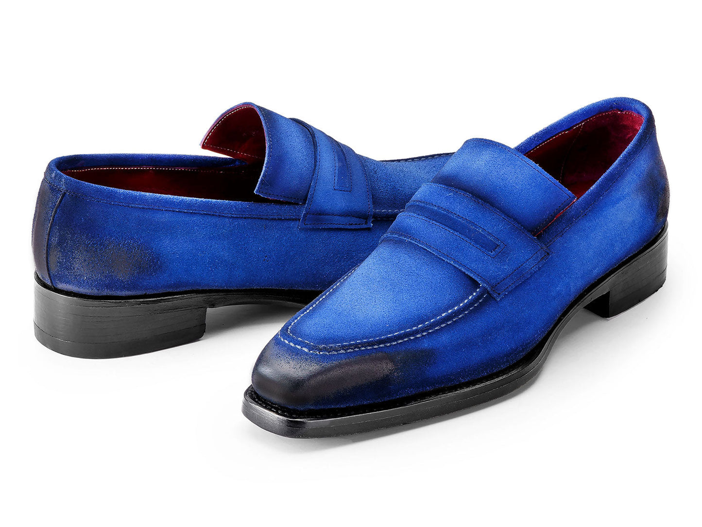 The Paul Parkman Blue Antique Suede Goodyear Welted Loafers (36BQ94) feature black accents and white stitching, shown against a white background.