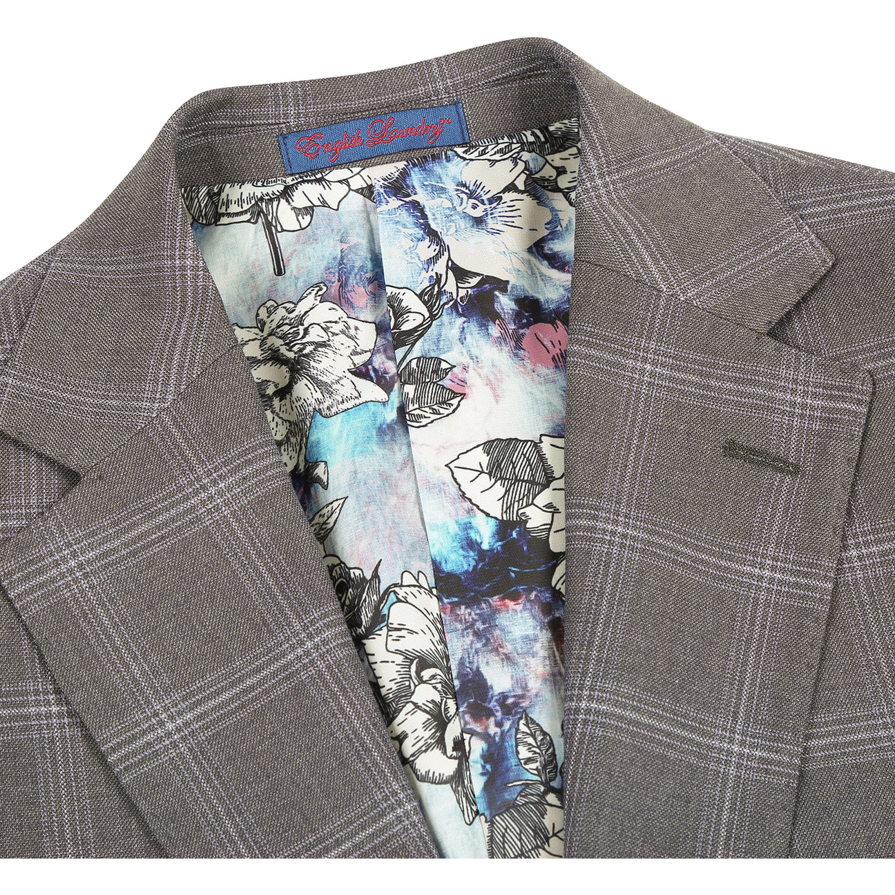 The ENGLISH LAUNDRY Grey Check Suit 12-55-095EL by English Laundry is a slim fit gray plaid blazer with notch lapels, two front flap pockets, and a colorful floral inner lining, shown on a white background.