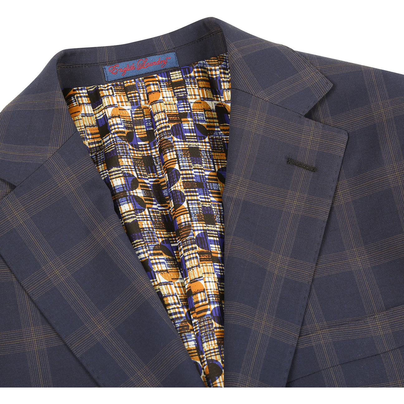 The ENGLISH LAUNDRY TR Suit 12-58-410EL by English Laundry is a navy blue plaid blazer with notch lapels, two buttons, flap pockets, and a colorful patterned inner lining shown in a front-facing view.