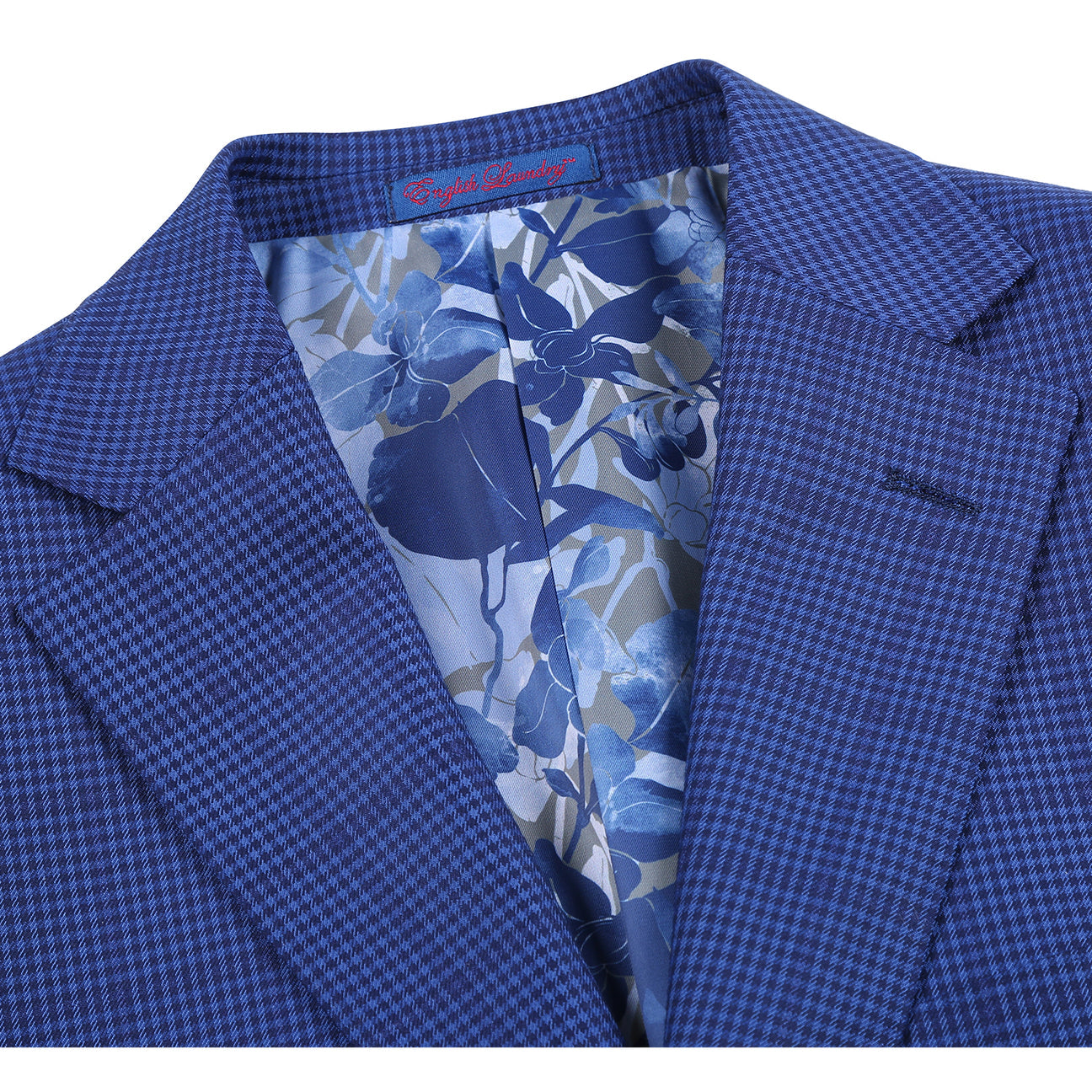 The English Laundry ENGLISH LAUNDRY 2pc Suit Navy 32-26-412EL is a men's slim-fit blazer with a single button, flap pockets, and floral lining.