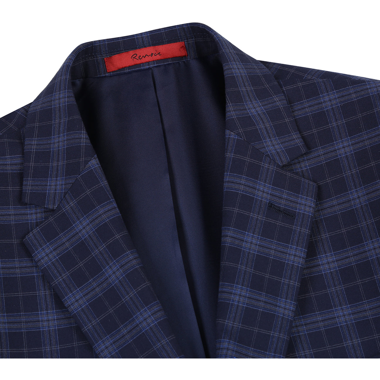 The Alessandro Vitello by Renoir slim fit suit jacket in navy, with a two-button closure, is showcased on a mannequin with a white shirt and maroon polka dot tie, made from a stylish blend of polyester, rayon, and spandex.