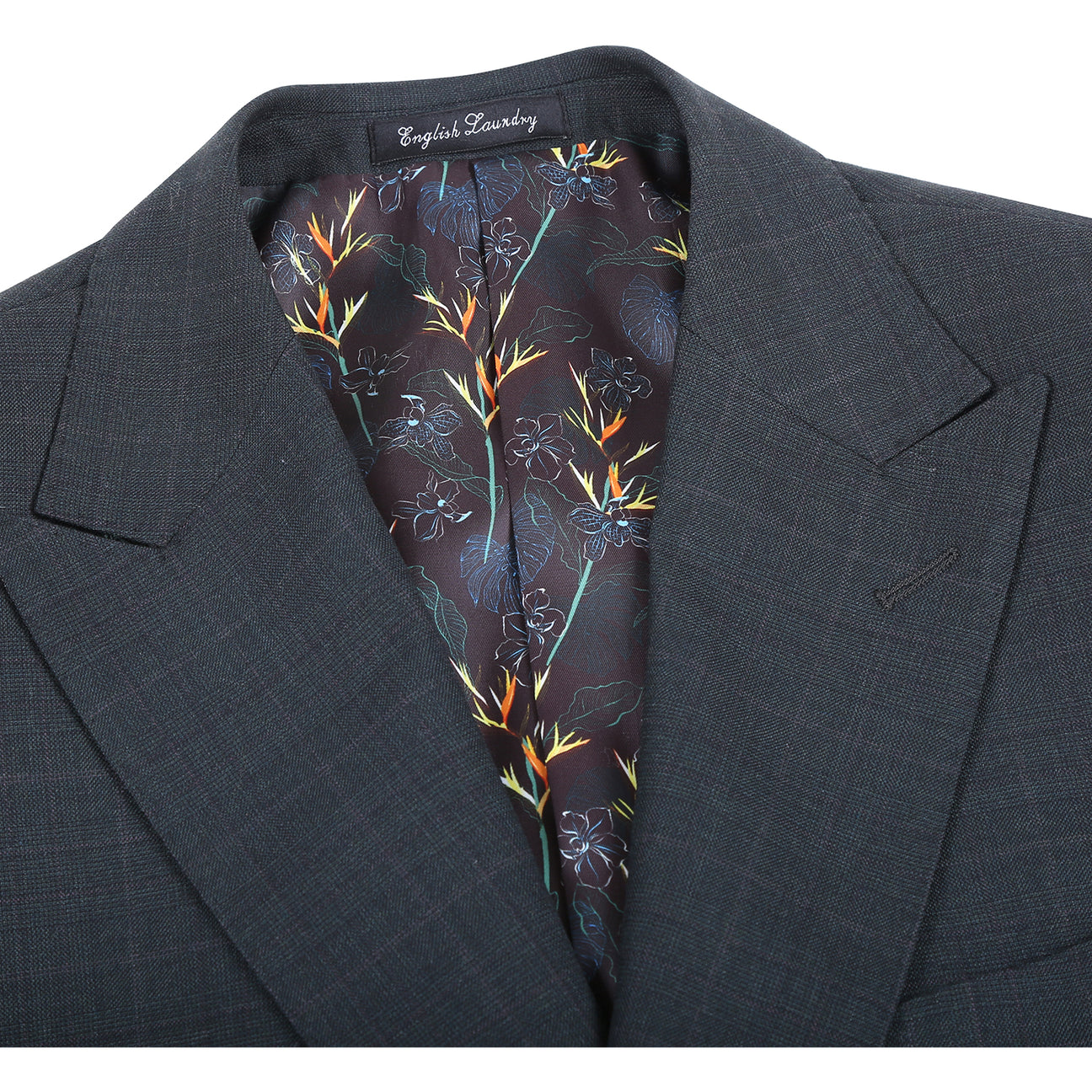 The ENGLISH LAUNDRY 2pc Wool Suit Olive EL22-58-341 by English Laundry features a slim fit jacket in olive wool with two buttons, subtle patterning, and a distinctive inner lining with colorful floral designs.