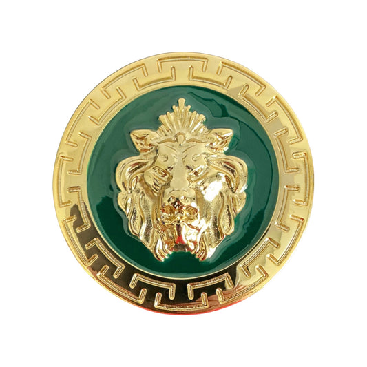 The Matiste Green/Gold Belt Buckle 40mm B40 features a raised gold lion head at the center and a geometric border—an Italian luxury accessory ideal for elevating any look.