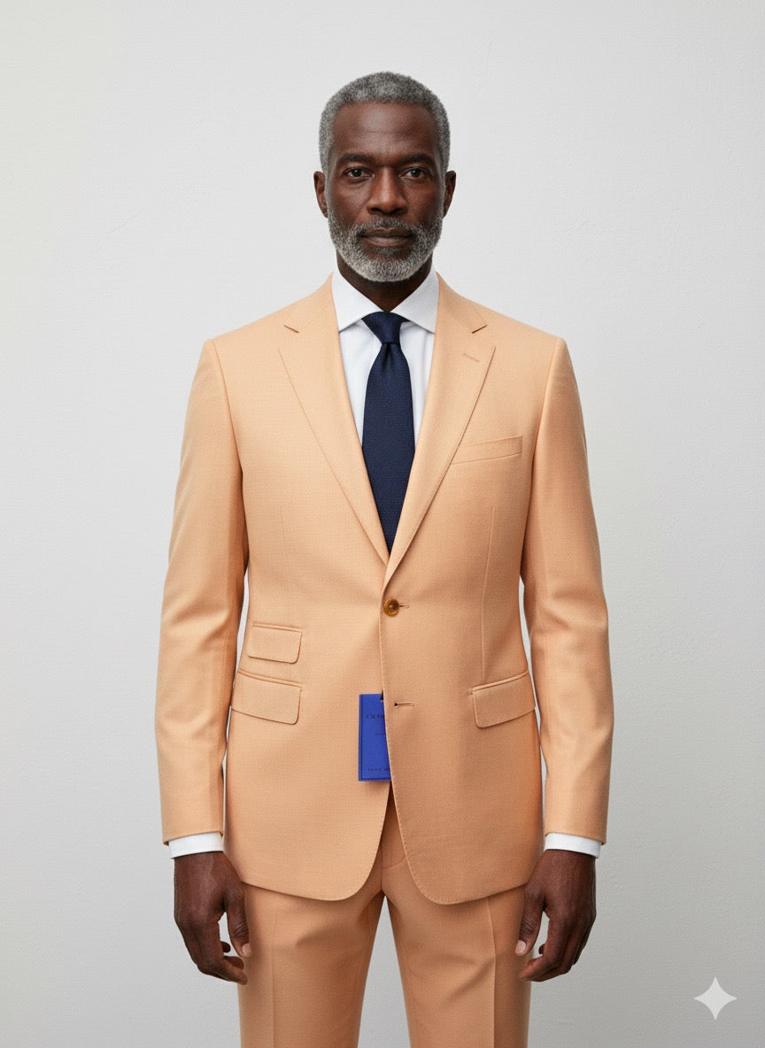 The Cavelli Uomo Porto SLIM FIT Suit 1986/11 in light orange by CAVELLI is shown on a hanger against a gray wood floor, featuring gold buttons and a blue tag. FINAL SALE: no returns or exchanges. Ideal for office wear.