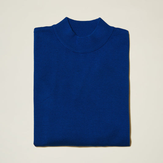 The Inserch Cotton Blend Mock Neck Sweater in River Blue (4308-000181) is neatly folded and displayed on a light background.
