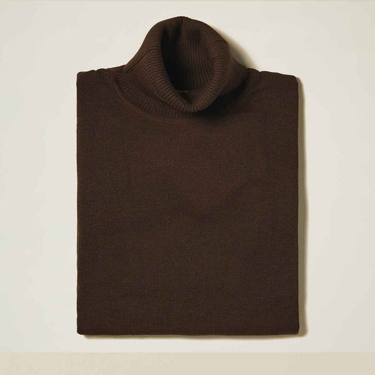 A close-up of the Inserch Cotton Blend Turtleneck Sweater Brown 4708 shows its textured fabric and collar stitching—an essential by Inserch for your fall wardrobe.