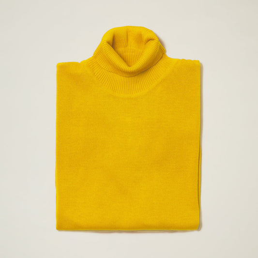 Folded orange Inserch Cotton Blend Turtleneck Sweater 4708, ideal for cozy fall days, showcased on a light background.