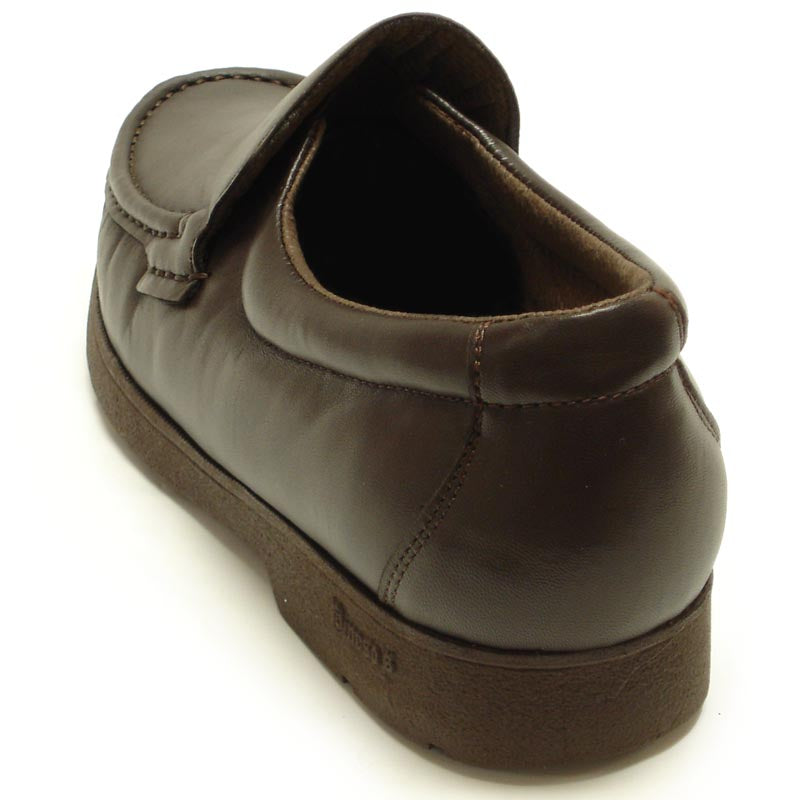 The P-4746-628 Brown Slip on Loafer by Pinoso's, made in Spain, features brown leather, stitched detailing, thick rubber soles, and handcrafted comfort, shown on a white background.