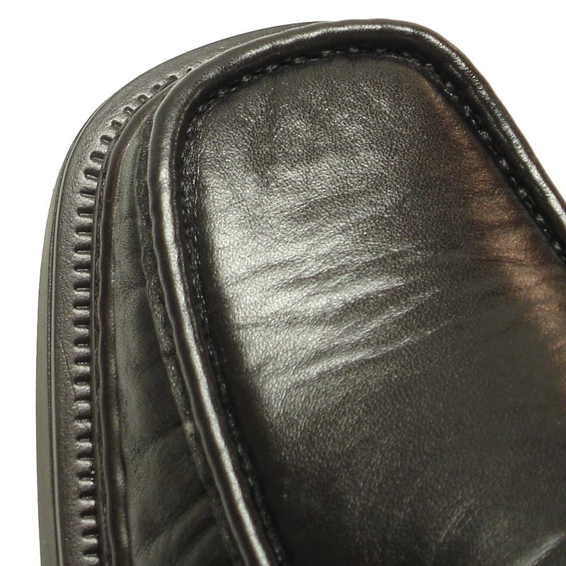 The P-4746 Belka Black Slip on Loafer by Pinoso's, handcrafted in Spain, features thick soles and premium leather for comfort. The men's shoes are shown side by side on a white background.