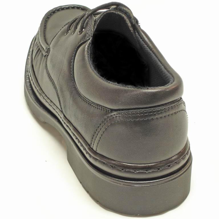A pair of Pinoso's P-4890 Belka Black Lace up men's shoes, made in Spain, with thick rubber soles, shown on a white background.
