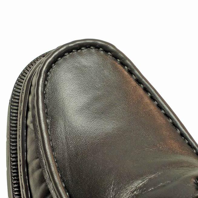 A pair of Pinoso's P-4890 Belka Black Lace up men's shoes, made in Spain, with thick rubber soles, shown on a white background.