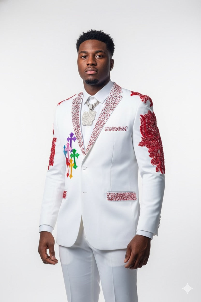 A man models the Unique Design Menswear Custom Prom Suit in white with red rhinestones, standing against a plain white background and highlighting the suit's artistic customization.