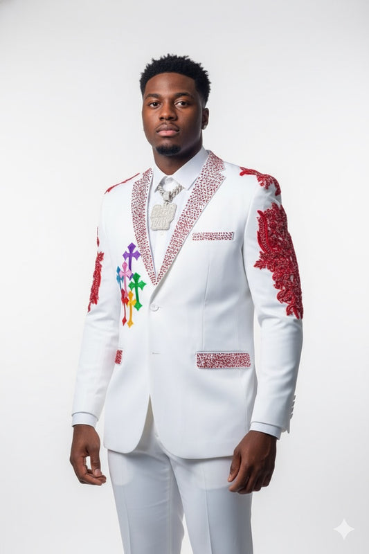 A man models the Unique Design Menswear Custom Prom Suit in white with red rhinestones, standing against a plain white background and highlighting the suit's artistic customization.