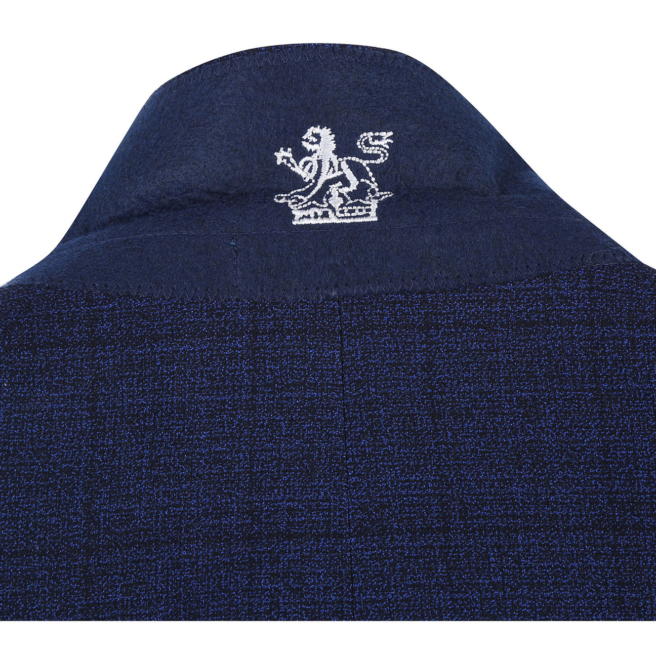 English Laundry's Blue Check Suit (92-05-410EL) showcases a dark blue blazer crafted with a textured fabric, complemented by a geometric patterned inner lining and designed in a slim fit featuring elegant peak lapels.