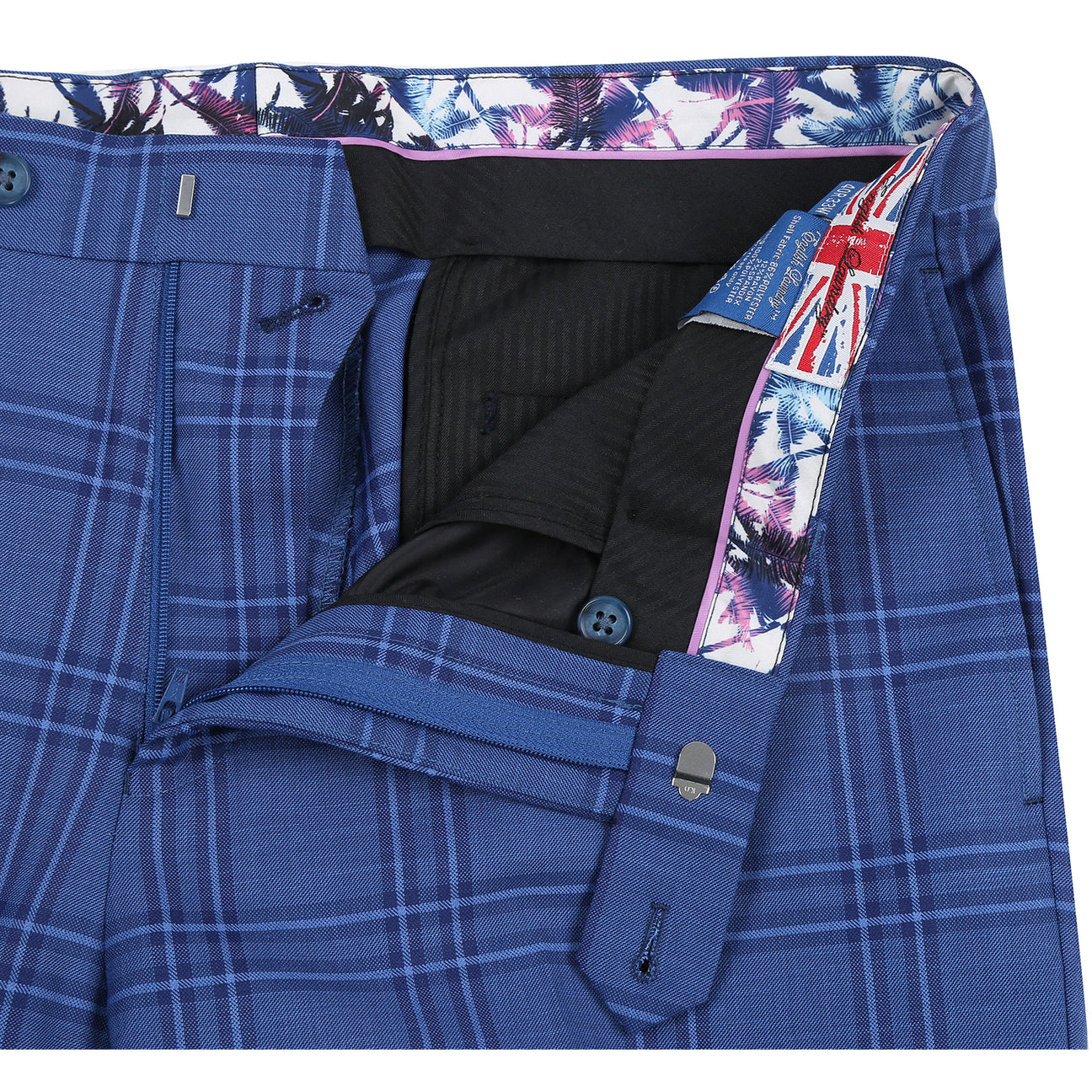 The ENGLISH LAUNDRY Blue Check Suit 12-63-411EL by English Laundry is a slim fit blue plaid blazer with two-button closure, notch lapels, front pockets, and a colorful floral lining, shown on a white background.