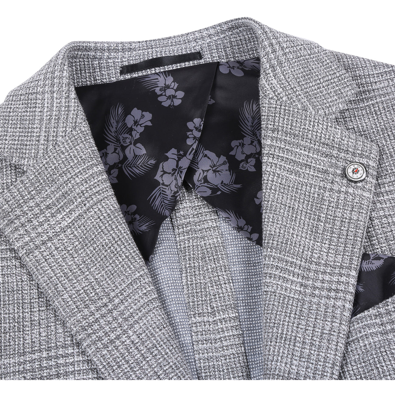 The Pellagio Light Gray Men's Slim Fit Riserva Jacket PS26-11 is styled on a mannequin with a white shirt, black tie, and black pocket square for a sleek look.