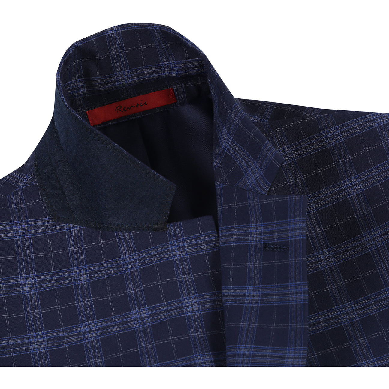 The Alessandro Vitello by Renoir slim fit suit jacket in navy, with a two-button closure, is showcased on a mannequin with a white shirt and maroon polka dot tie, made from a stylish blend of polyester, rayon, and spandex.