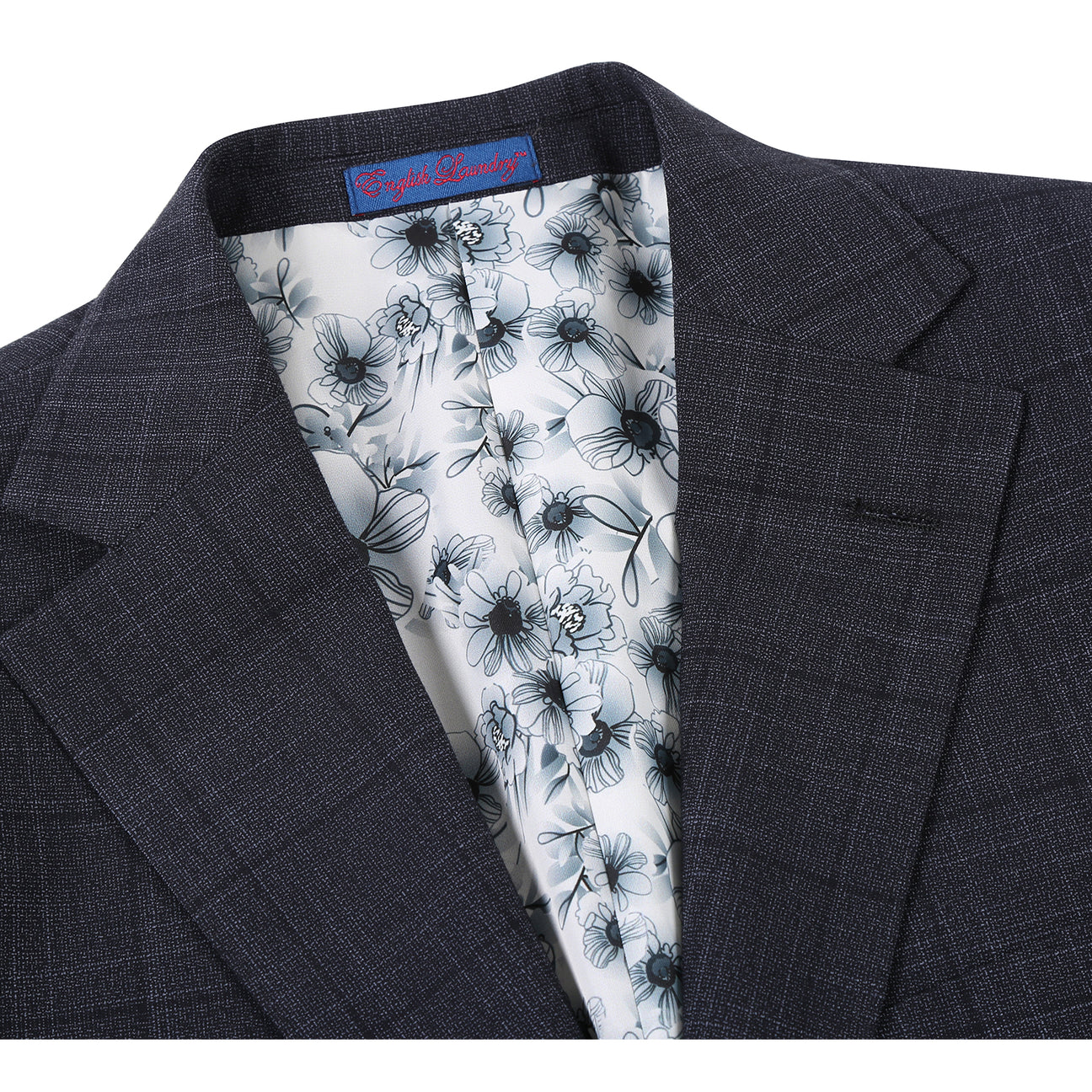 The ENGLISH LAUNDRY Dark Gray Check Suit 22-53-095EL by English Laundry features a slim fit jacket with notch lapels, shown over a white dress shirt and red polka dot tie on a mannequin.