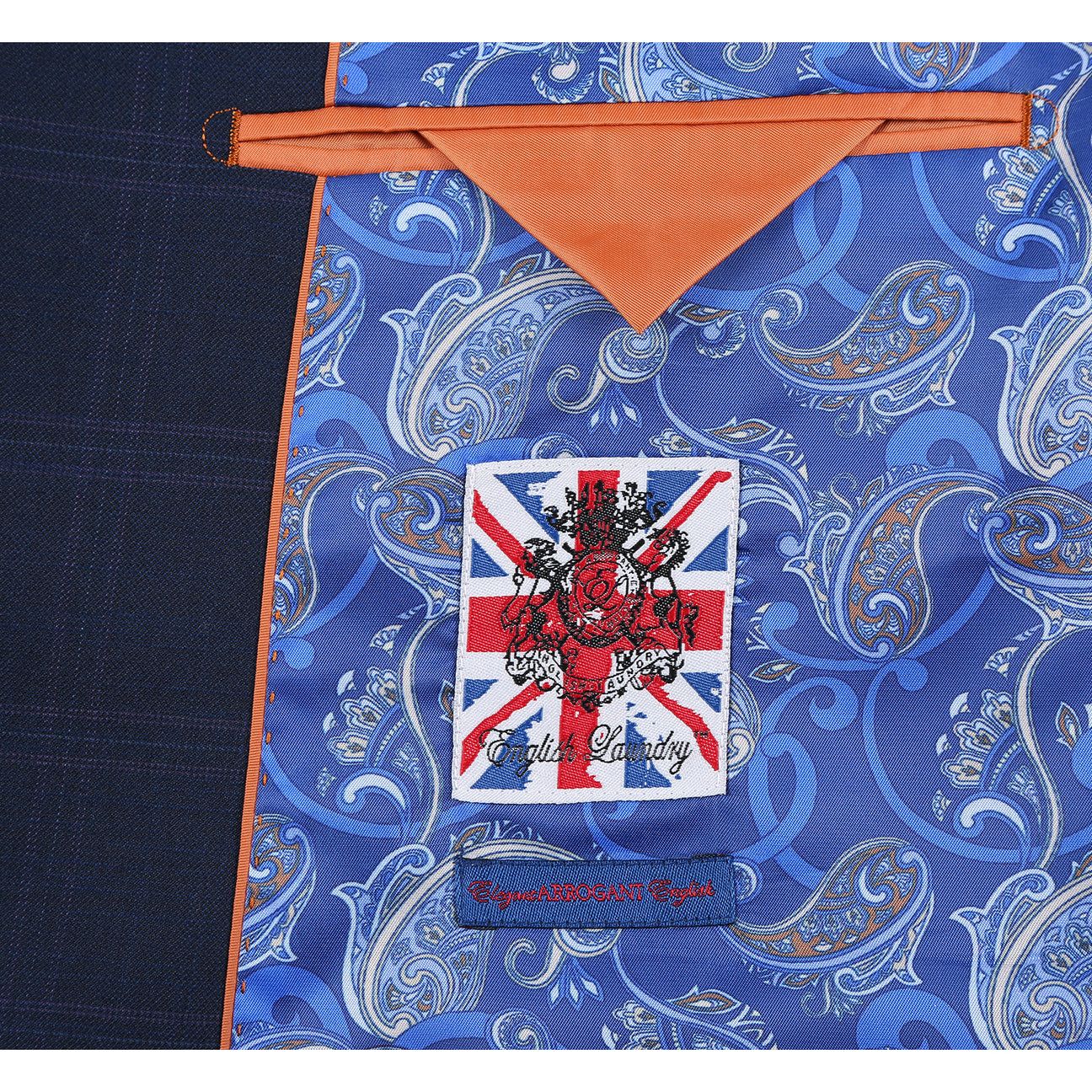 The ENGLISH LAUNDRY 2pc Suit Navy 32-55-410EL by English Laundry features a navy blue plaid blazer with single button closure, front pockets, and blue paisley inner lining in a comfy polyester-rayon-spandex blend, shown on a white background.
