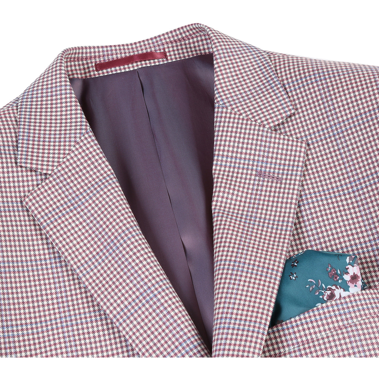 A mannequin displays the Alessandro Vitello by Renoir Slim Fit Wool Blazer in pink, crafted from 100% wool. It's styled with a white shirt, patterned black tie, and highlighted by a teal pocket square.