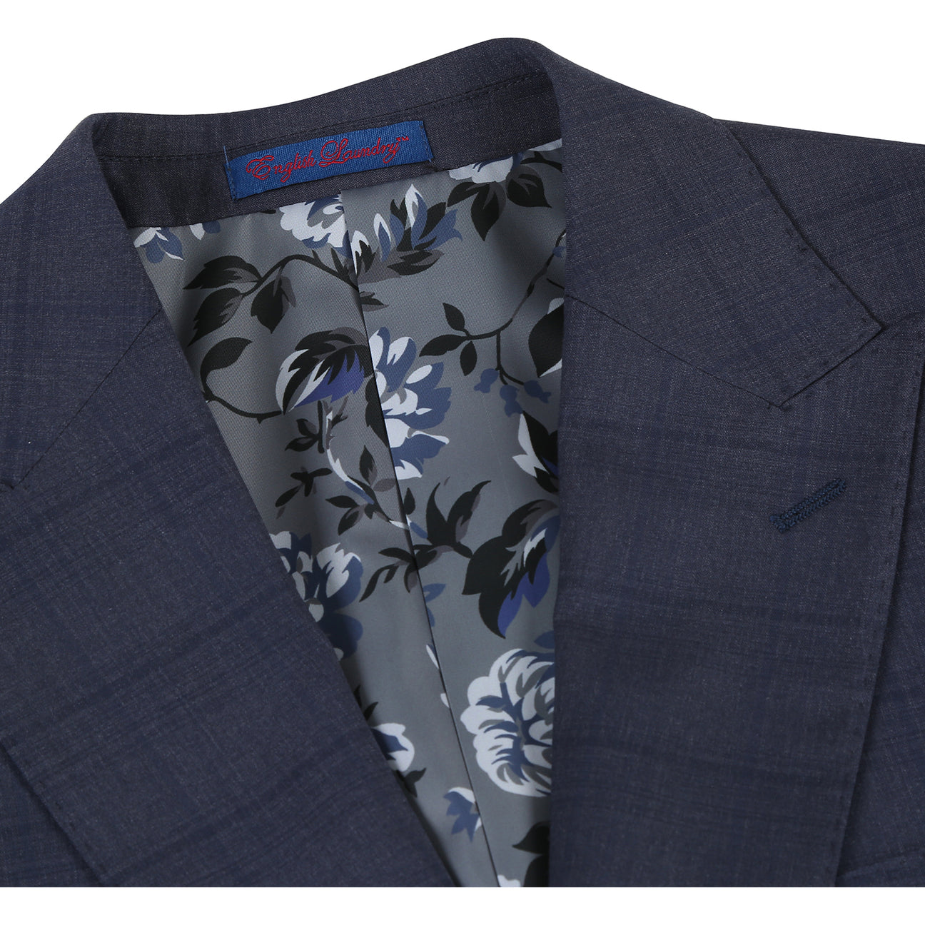 The ENGLISH LAUNDRY Grey Blue Check Suit 12-52-095EL by English Laundry is styled over a white dress shirt and a patterned blue tie, displayed on a headless mannequin.