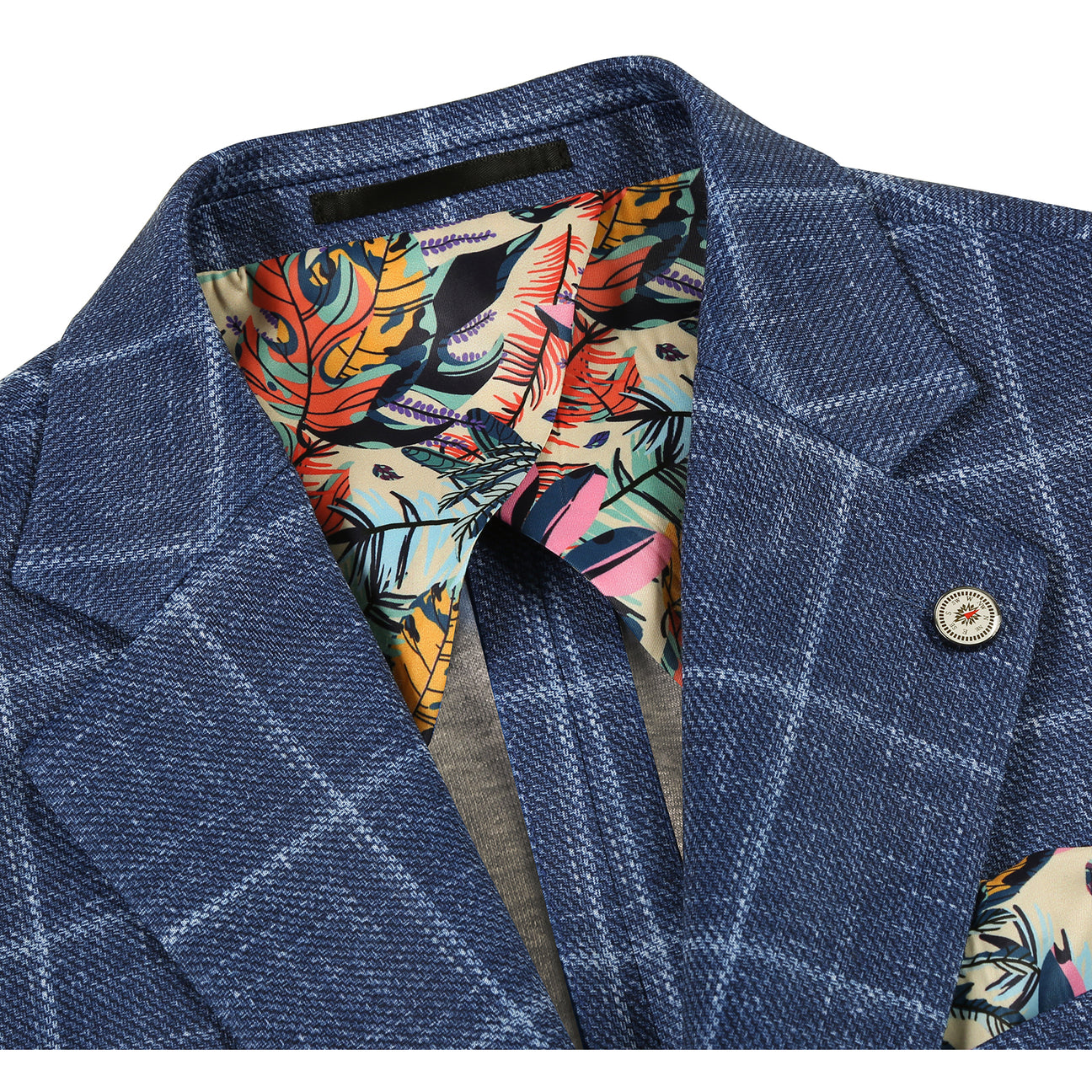 The Pellagio Riserva JKT Blazer PS25-6 by Pellagio is a blue plaid slim fit blazer with notched lapel, single button closure, and chest pocket with pocket square, styled over a white shirt and striped tie on a mannequin.
