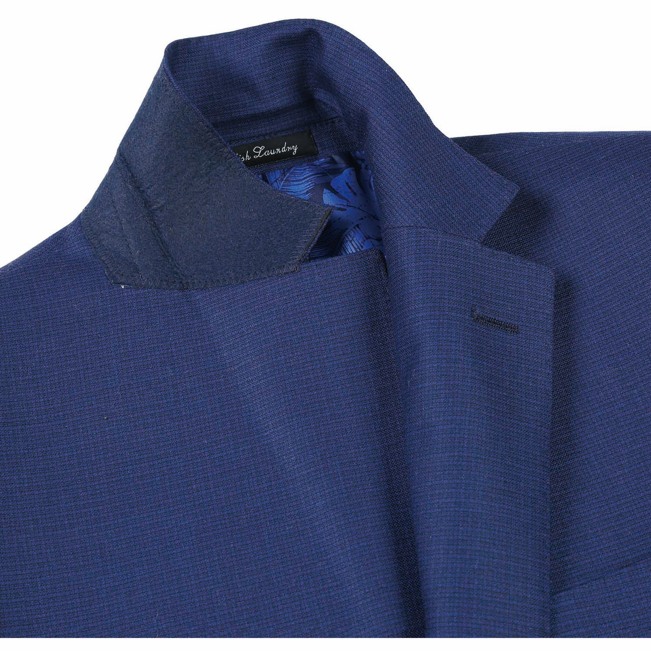 The ENGLISH LAUNDRY Blue Wool Suit EL82-22-411 by English Laundry, with its slim-fit design, is stylishly displayed on a mannequin alongside a crisp white shirt and an orange patterned tie.