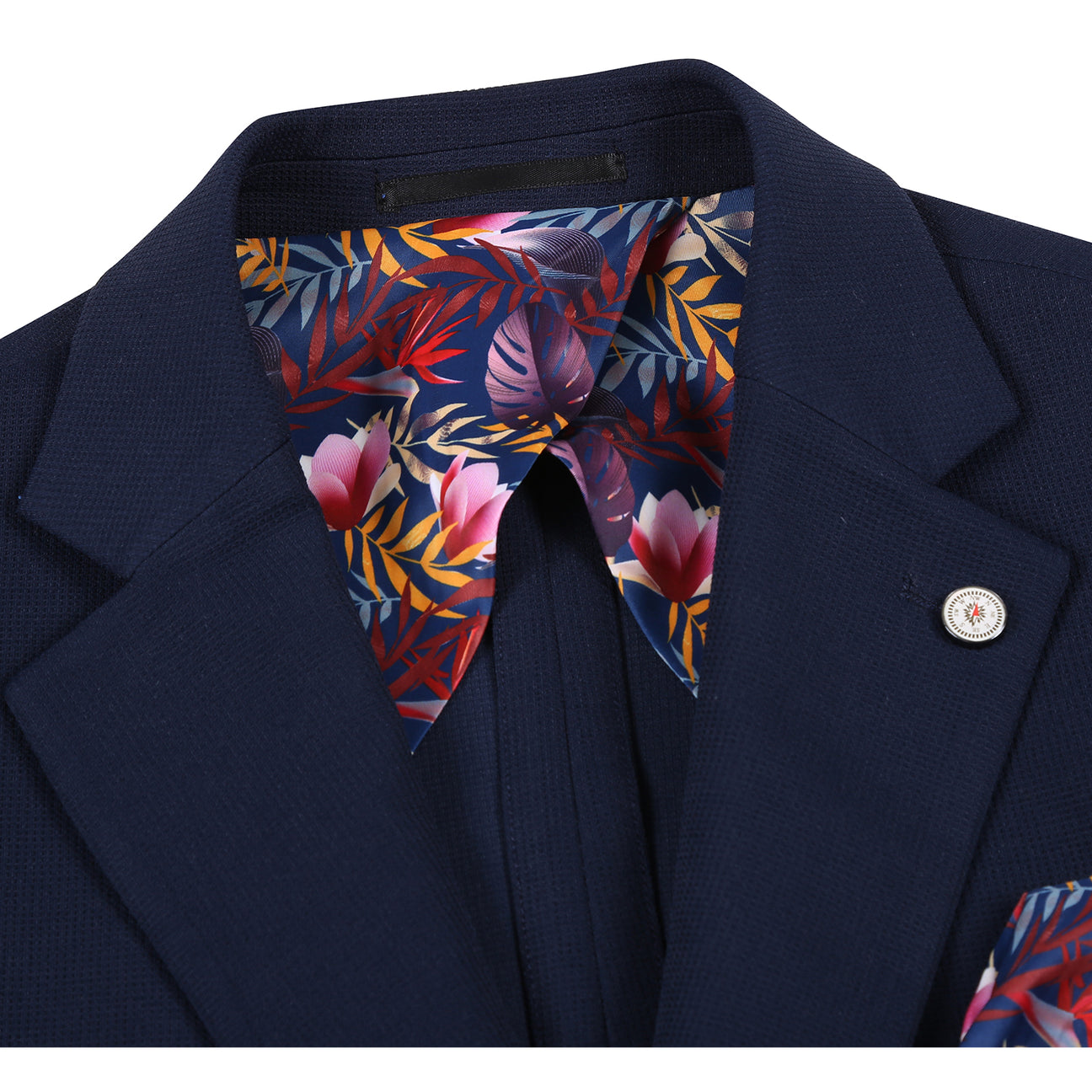 The Pellagio Men's Half Canvas Blazer Navy PS25-17, a single-breasted jacket with notched lapel and two buttons, is styled with a white dress shirt, patterned beige tie, and colorful pocket square on a display mannequin.