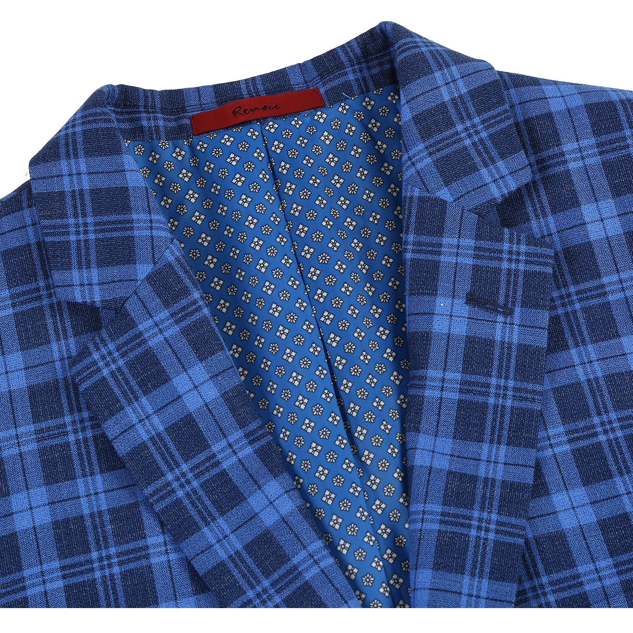 The Renoir Alessandro Vitello Slim Fit Blazer in royal blue (294-17) features classic notch lapels, a single button closure, and is styled with a white shirt and dark red polka dot tie on a mannequin for a refined look.