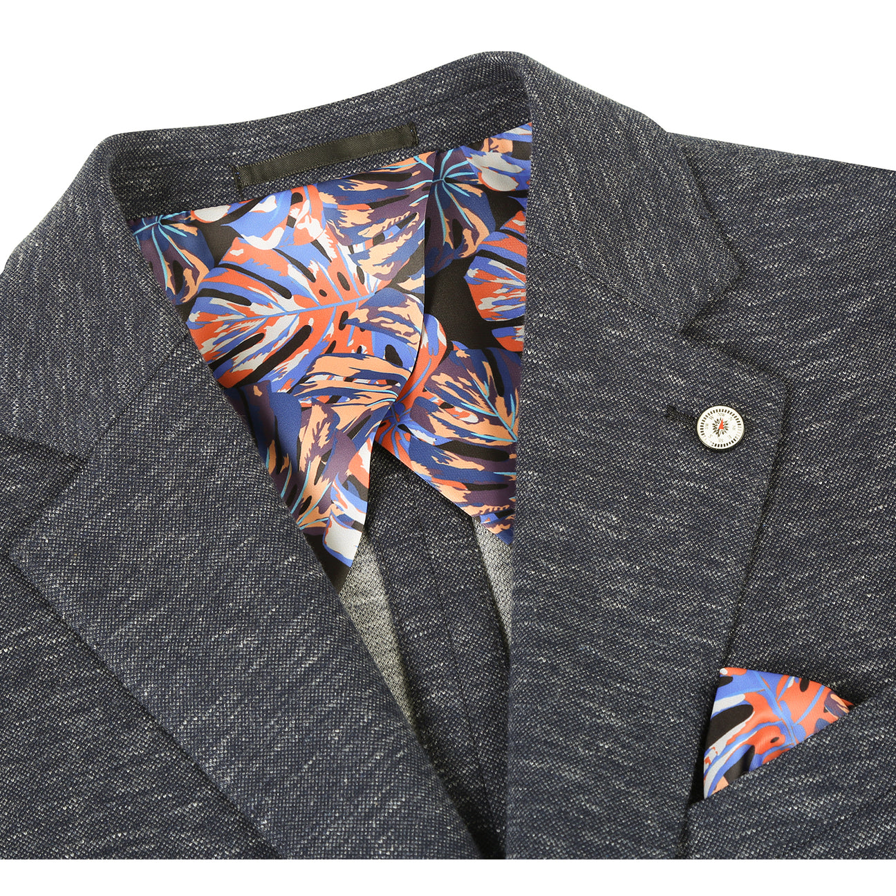The Pellagio Men's Half Canvas Blazer Gray Blue PF24-1, a slim fit with notched lapel, is showcased on a mannequin with a white shirt, striped tie, and colorful pocket square.