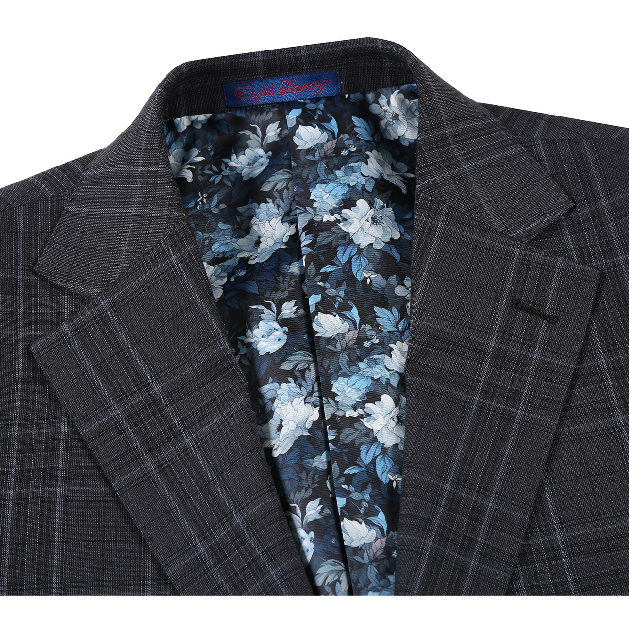 The ENGLISH LAUNDRY Dark Gray Check Suit 22-57-095EL by English Laundry features a slim fit, black and gray plaid design with a two-button closure, styled over a white shirt and blue patterned tie on a mannequin.