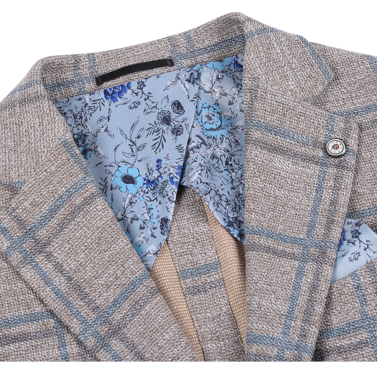 The Pellagio Camel Men's Slim Fit Riserva Jacket PS26-13 is styled on a mannequin with a white shirt, green patterned tie, and blue pocket square for a refined slim fit look.