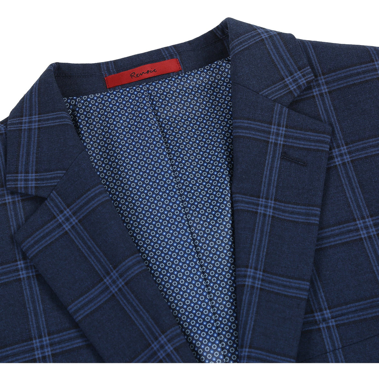 The Alessandro Vitello by Renoir Slim Fit Suit 293-22 features a navy plaid blazer on a mannequin with a white dress shirt, a burgundy polka dot tie, and flat front pants, complete with a notch lapel for sophistication.