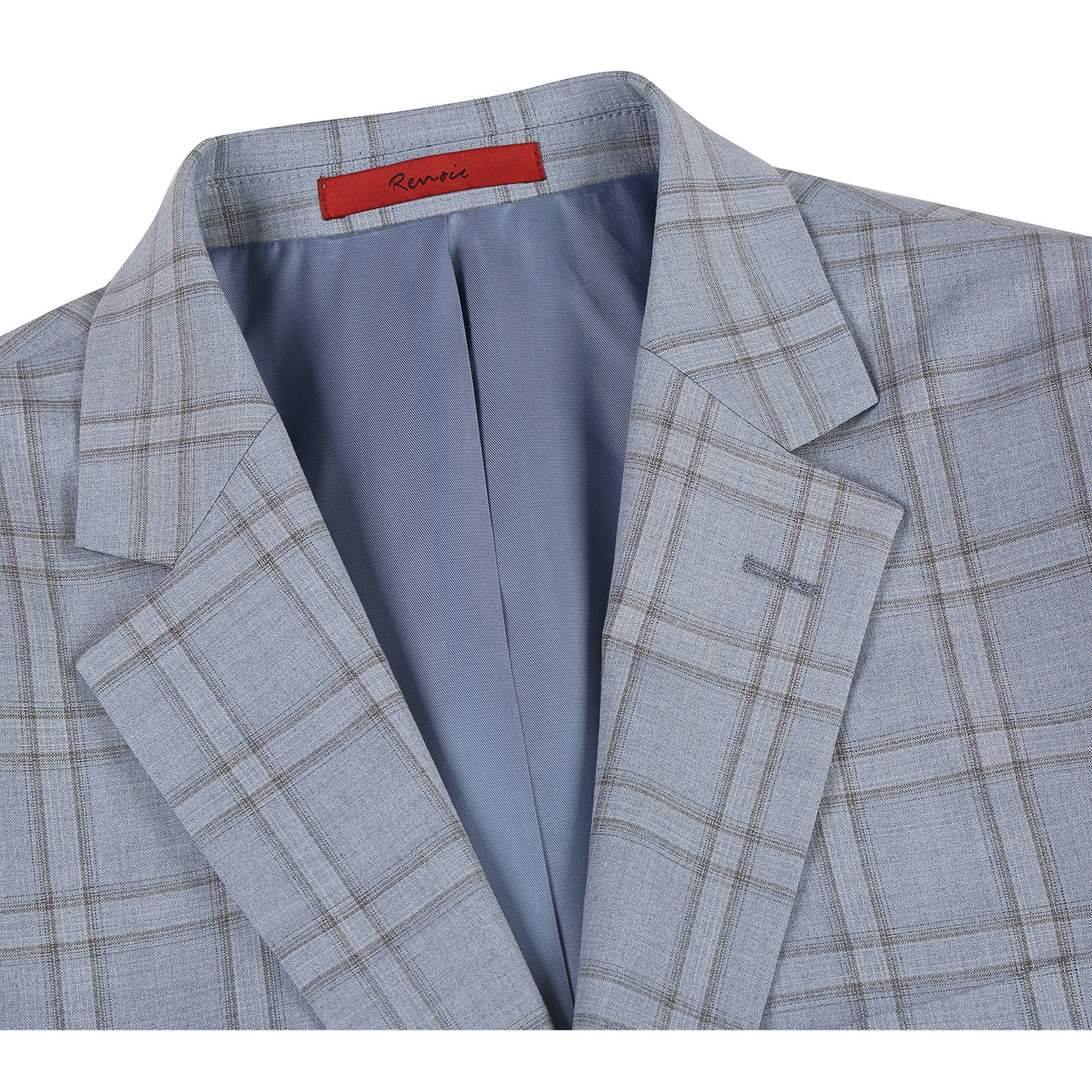 The Renoir Alessandro Vitello Blue 293-40 slim fit suit jacket, paired with a white shirt and red patterned tie, is elegantly displayed on a mannequin.