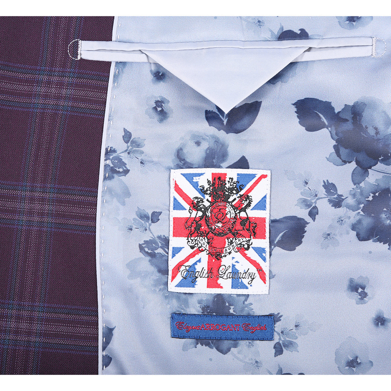 The English Laundry 2pc Suit (Purple, style 32-69-702EL) features a single-breasted jacket with two buttons, notched lapels, flap pockets, and a light blue floral lining.