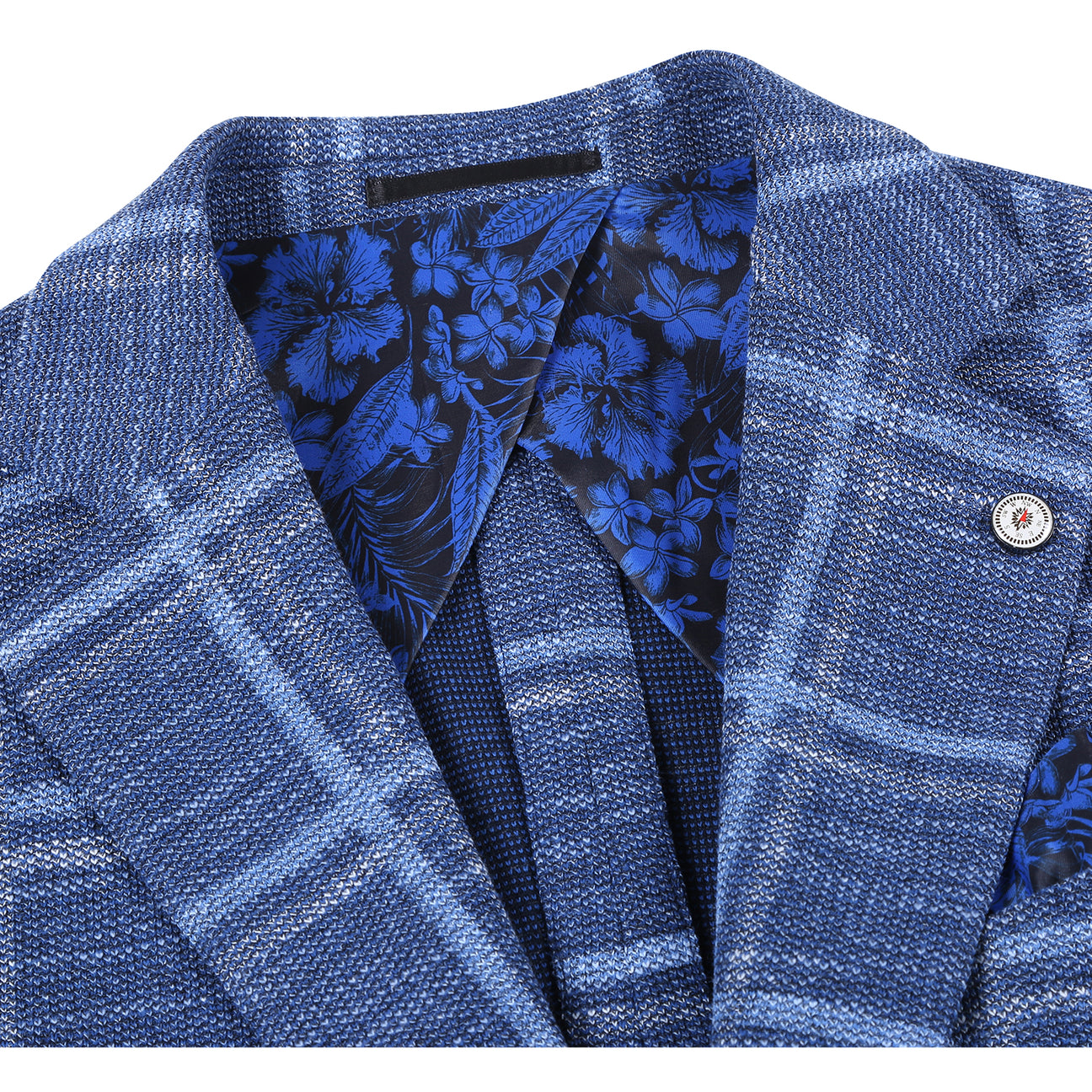 Displayed on a headless mannequin: the Pellagio Navy Blue Men's Slim Fit Riserva Jacket PS26-12, paired with a white dress shirt, orange patterned tie, and blue pocket square.