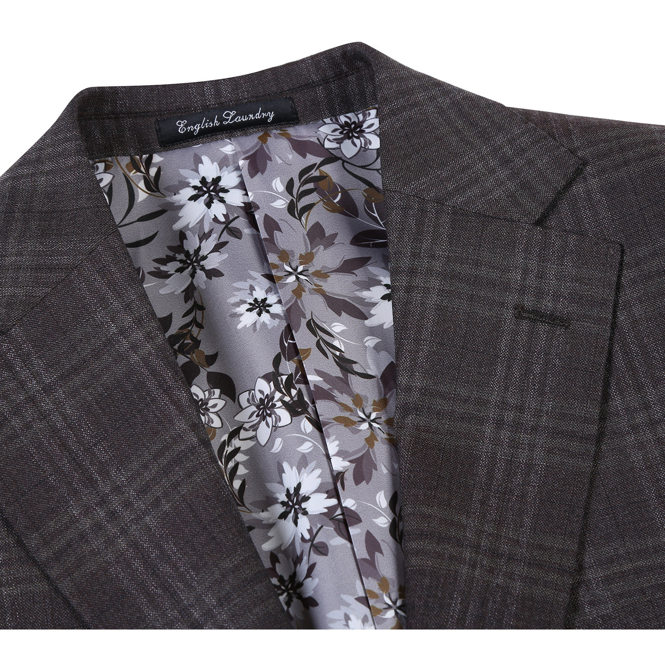 A mannequin showcases the English Laundry ENGLISH LAUNDRY Brown Check Suit EL12-58-555 with notch lapels, paired with a white dress shirt and a blue, brown, and gray striped tie.