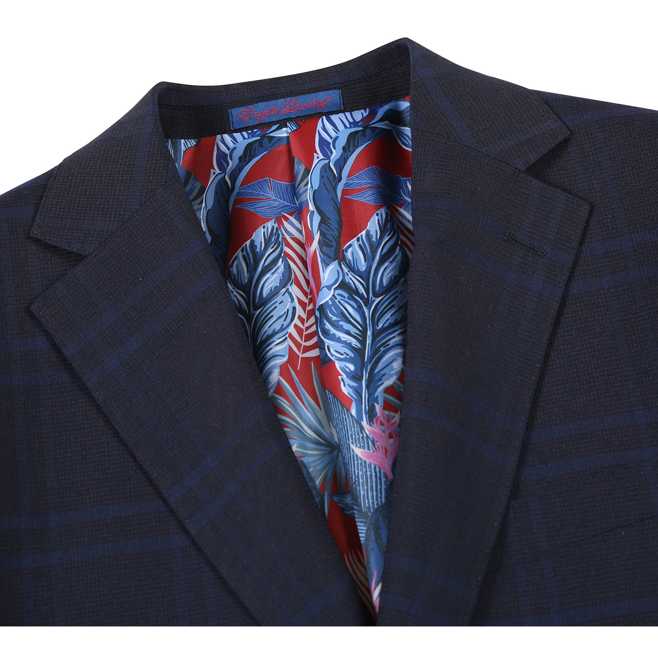 The ENGLISH LAUNDRY Navy Check Suit 22-20-410EL by English Laundry features a slim fit jacket with notched lapels, two-button closure, white dress shirt, and blue patterned tie—perfect for any formal occasion.