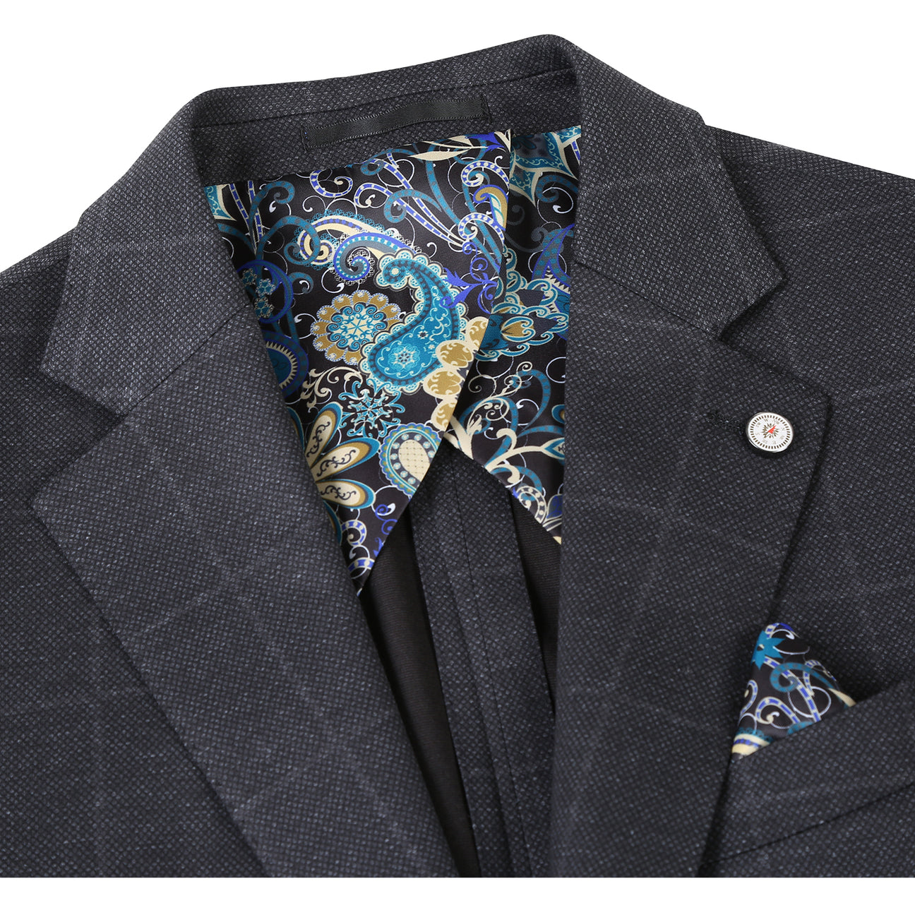 The Pellagio Ink Blue Men's Half Canvas Blazer PF24-7, featuring a single-breasted design and notched lapel, drapes elegantly on the mannequin over a crisp white shirt. A red polka dot tie and patterned pocket square complete the sophisticated ensemble.