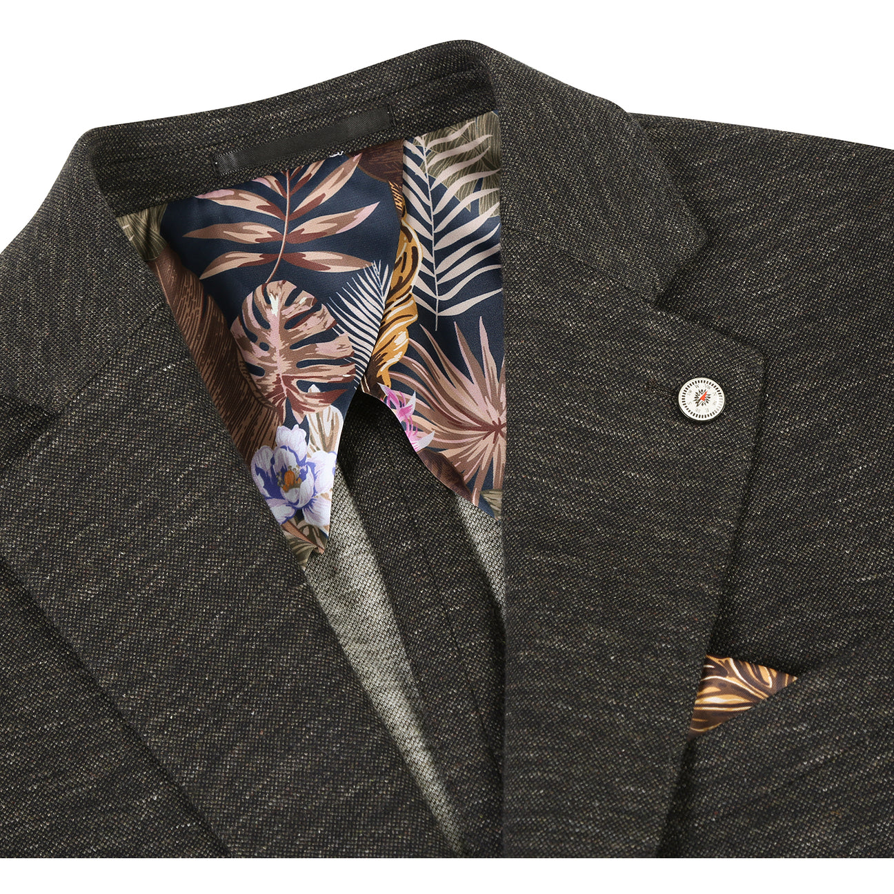 Displayed on a mannequin, the Pellagio Dark Brown Men's Half Canvas Blazer PF24-3 features a classic notched lapel and is paired with a striped tie, white shirt, and patterned pocket square.