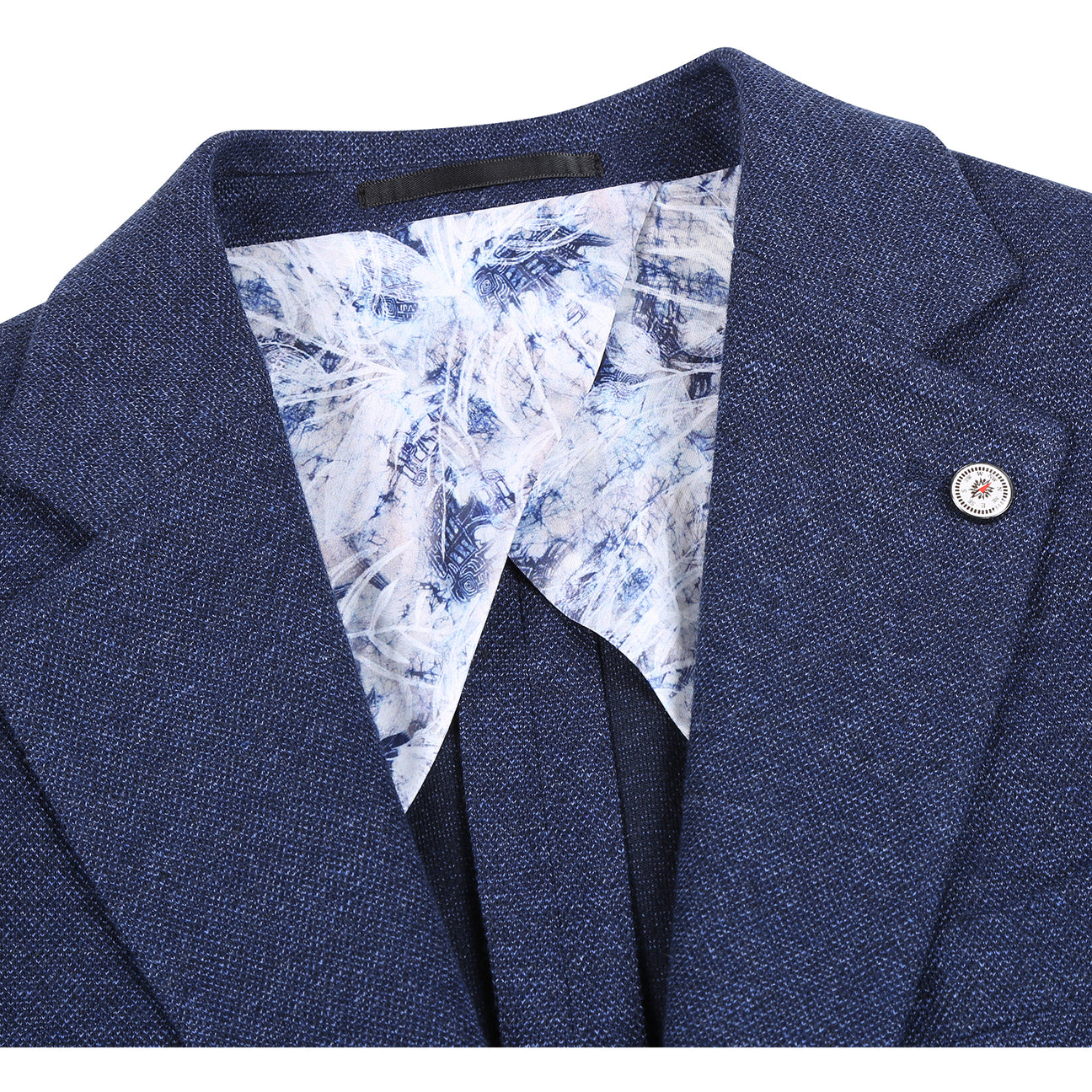 The Pellagio Men's Slim Fit Riserva Jacket Navy PF25-9 is styled over a white dress shirt with a striped orange and blue tie and patterned pocket square, displayed on a mannequin.